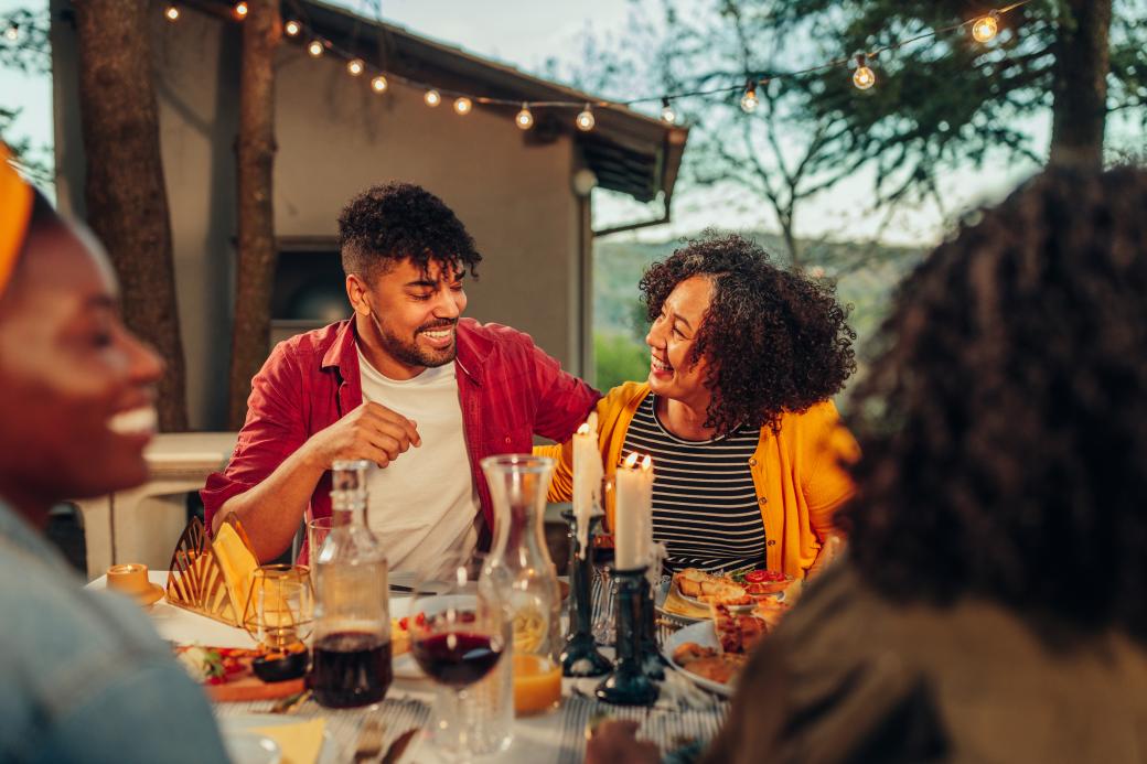 Friends enjoying drinks on a patio