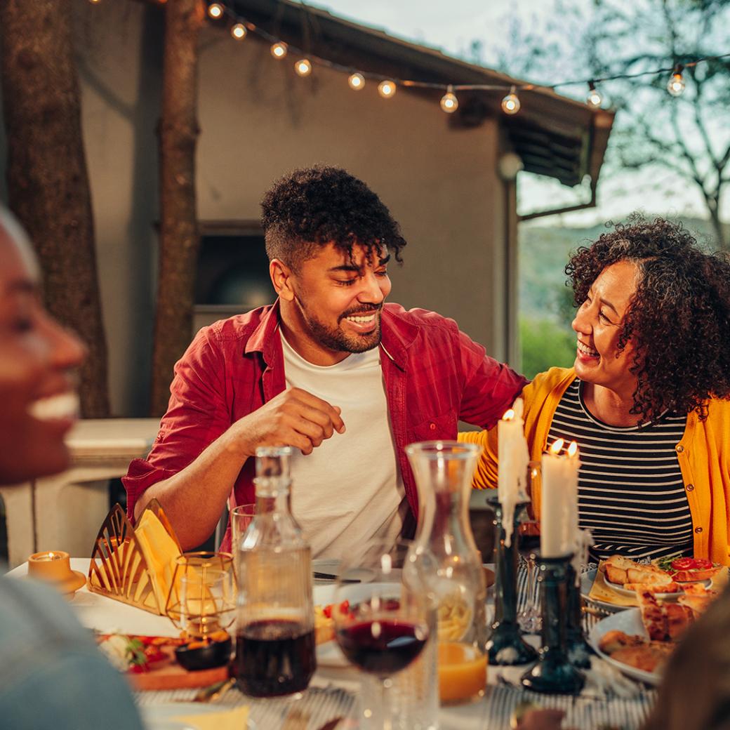 Friends enjoying drinks on a patio