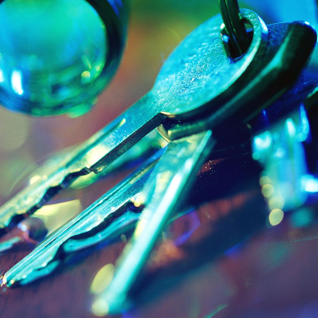 Keys on bar surface representing impaired driving